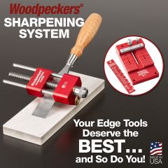 Woodpeckers Sharpening Guide with bench chisel on sharpening stone. Angle Gauge and Angle Fixture in background.