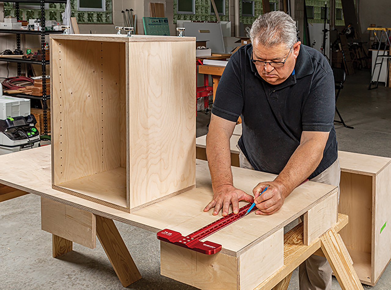 cribed the offset for the cabinet bases and positioned each one to the line